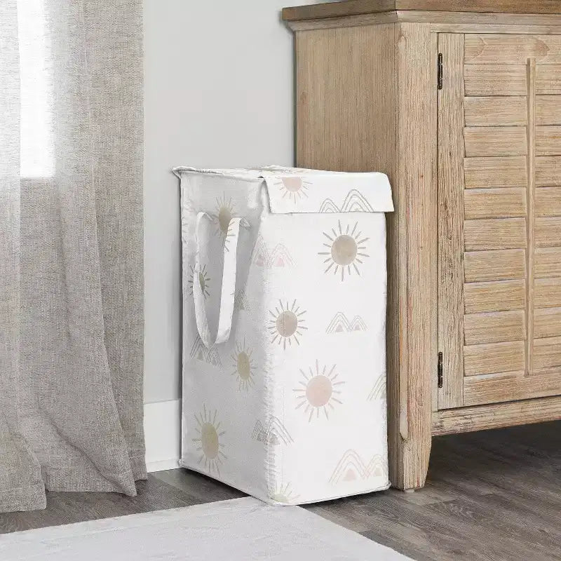 Cesto portabiancheria pieghevole per bambina con manici rosa beige