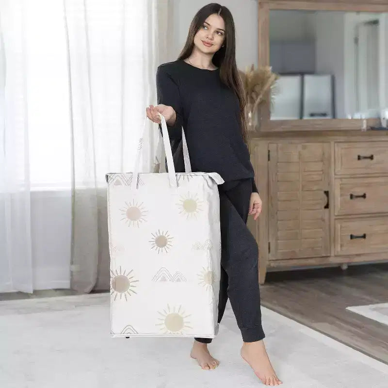 Cesto portabiancheria pieghevole per bambina con manici rosa beige