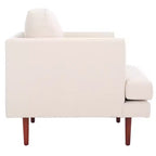 Poltrona imbottita in lino con gambe in legno
