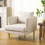 Poltrona imbottita in lino con gambe in legno